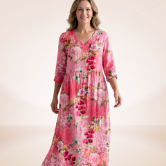 Floral relaxed dress in bright pink with large flower print, V-neck, 3/4 sleeves, midi length