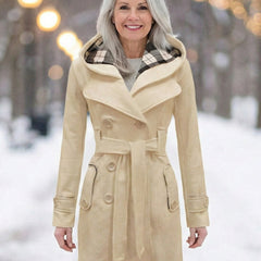 Cream wool hooded coat with plaid-lined hood, double-breasted buttons, and waist belt.