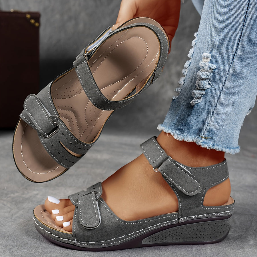 Grey leather open-toe sandals with two hook-and-loop straps and stitched platform sole