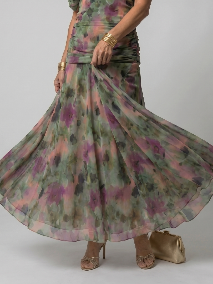 Off-shoulder maxi dress with multicolor swirl print, flowing gathered skirt