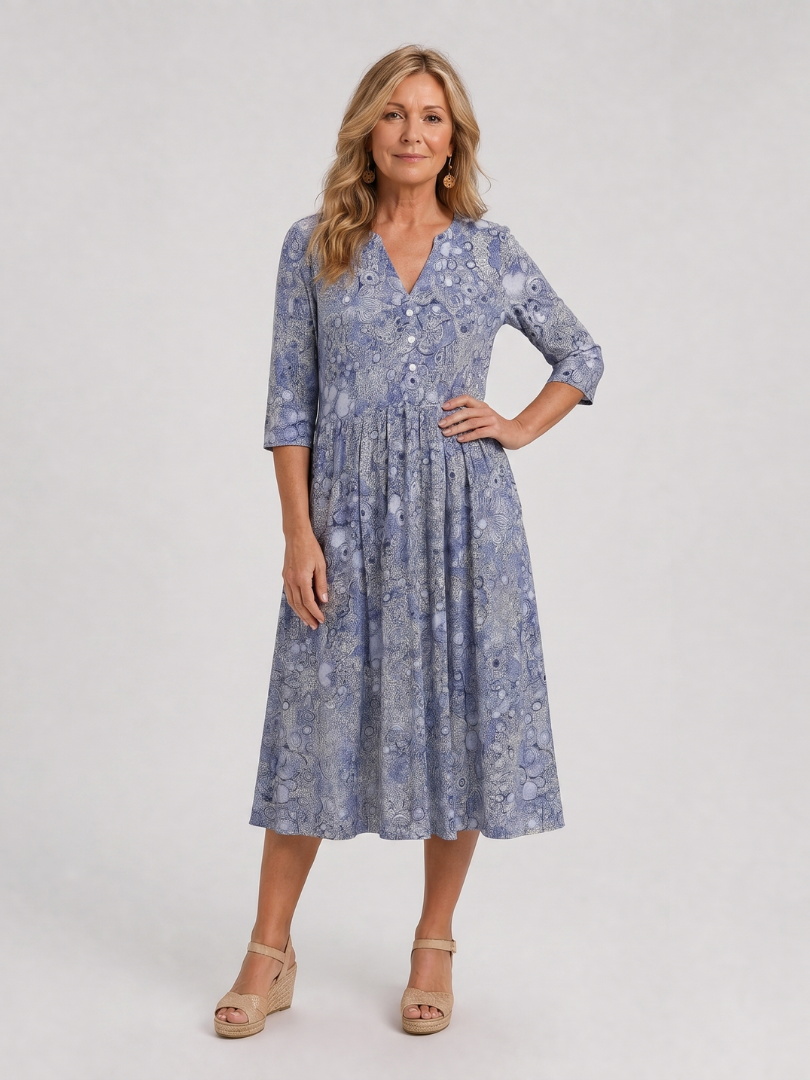 Blue floral midi dress with V-neck and three-quarter sleeves with button detailing
