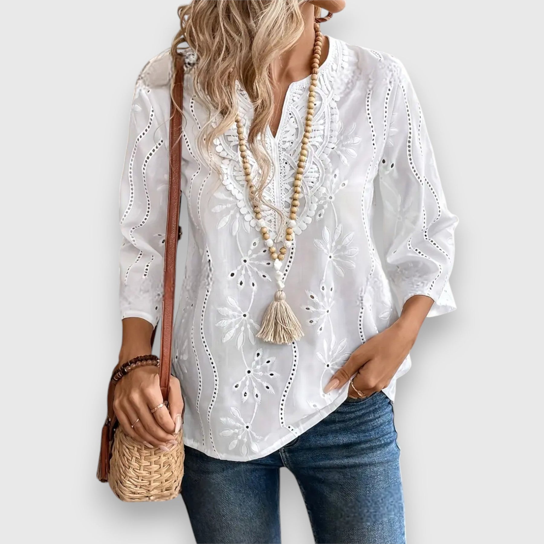 White embroidered V-neck long sleeve blouse with eyelet cutwork pattern