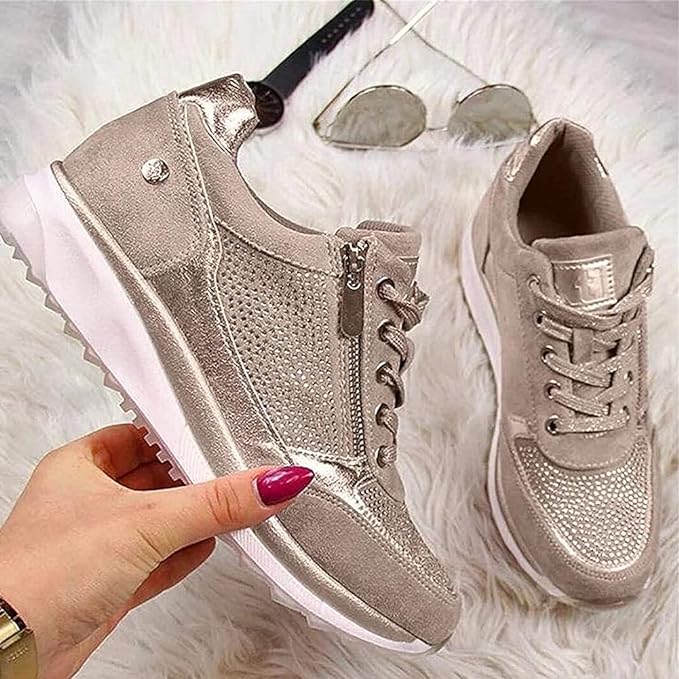 Beige metallic zip-up comfort sneaker pair, lace-up front and side zipper