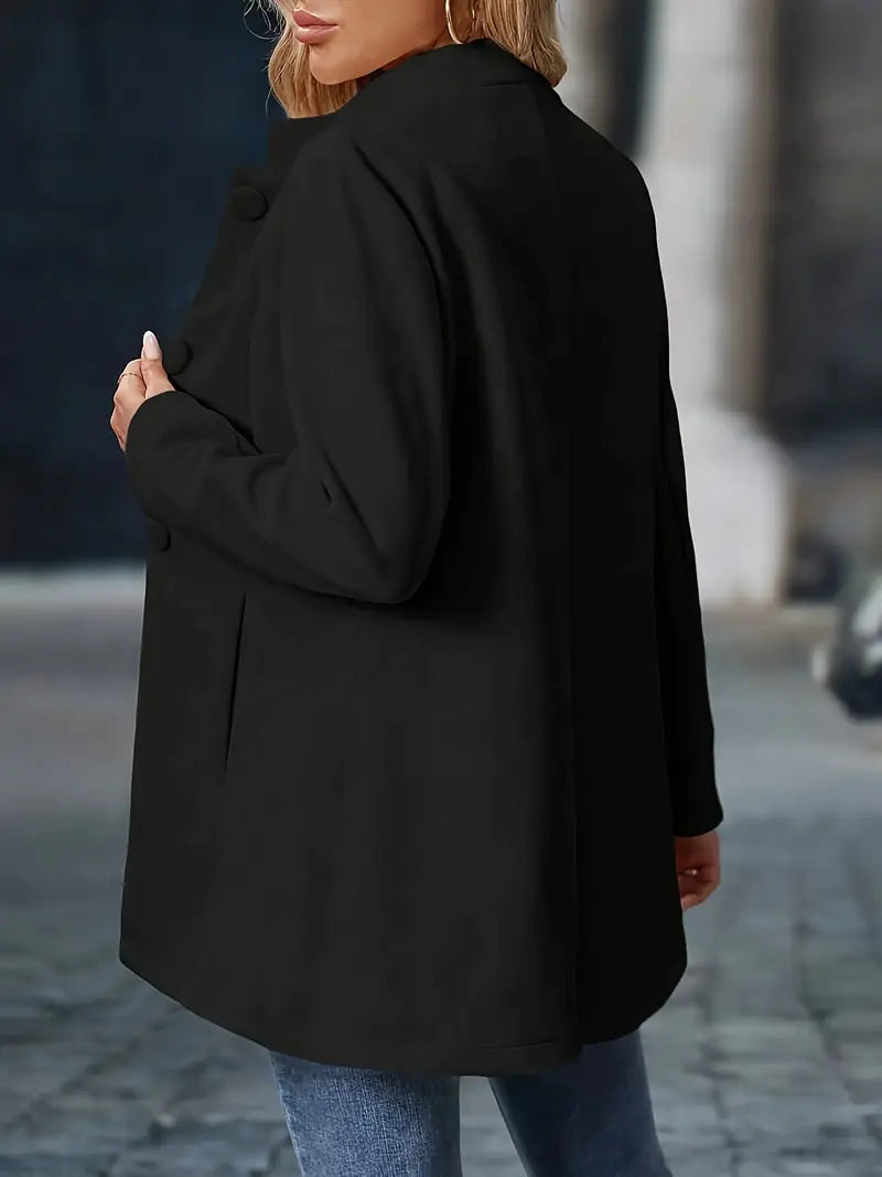 Black back view tailored coat with rounded button details and long sleeves