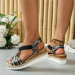 Kristy platform sandals with black-and-white striped ankle straps and espadrille rope wedge