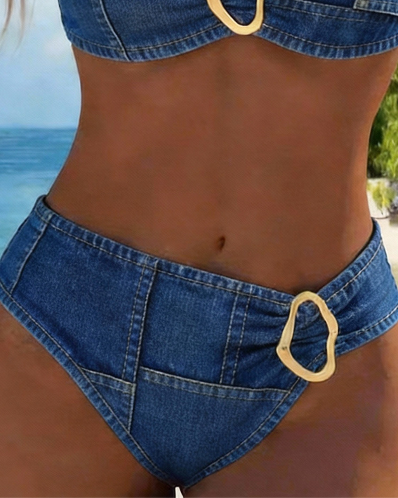 Blue denim-style high-waist bikini bottom with center oval metal buckle detail