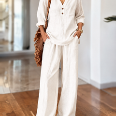 White long-sleeve two-piece set with V-neck tunic top and relaxed wide-leg pants