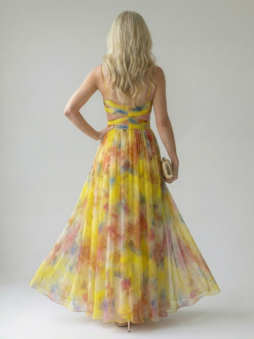 Back view of yellow multicolor soft-wrap maxi dress with cross-back straps