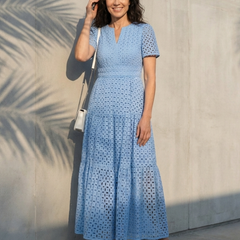 Sky blue V-neck tiered maxi dress, front view with short sleeves and patterned fabric