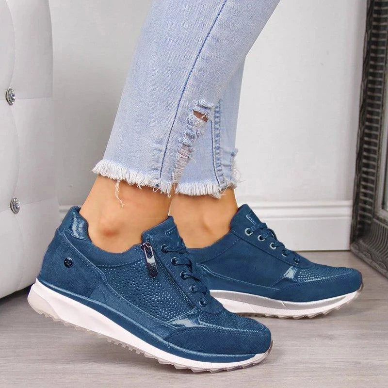 Blue metallic zip-up comfort sneakers with lace-up front and side zipper