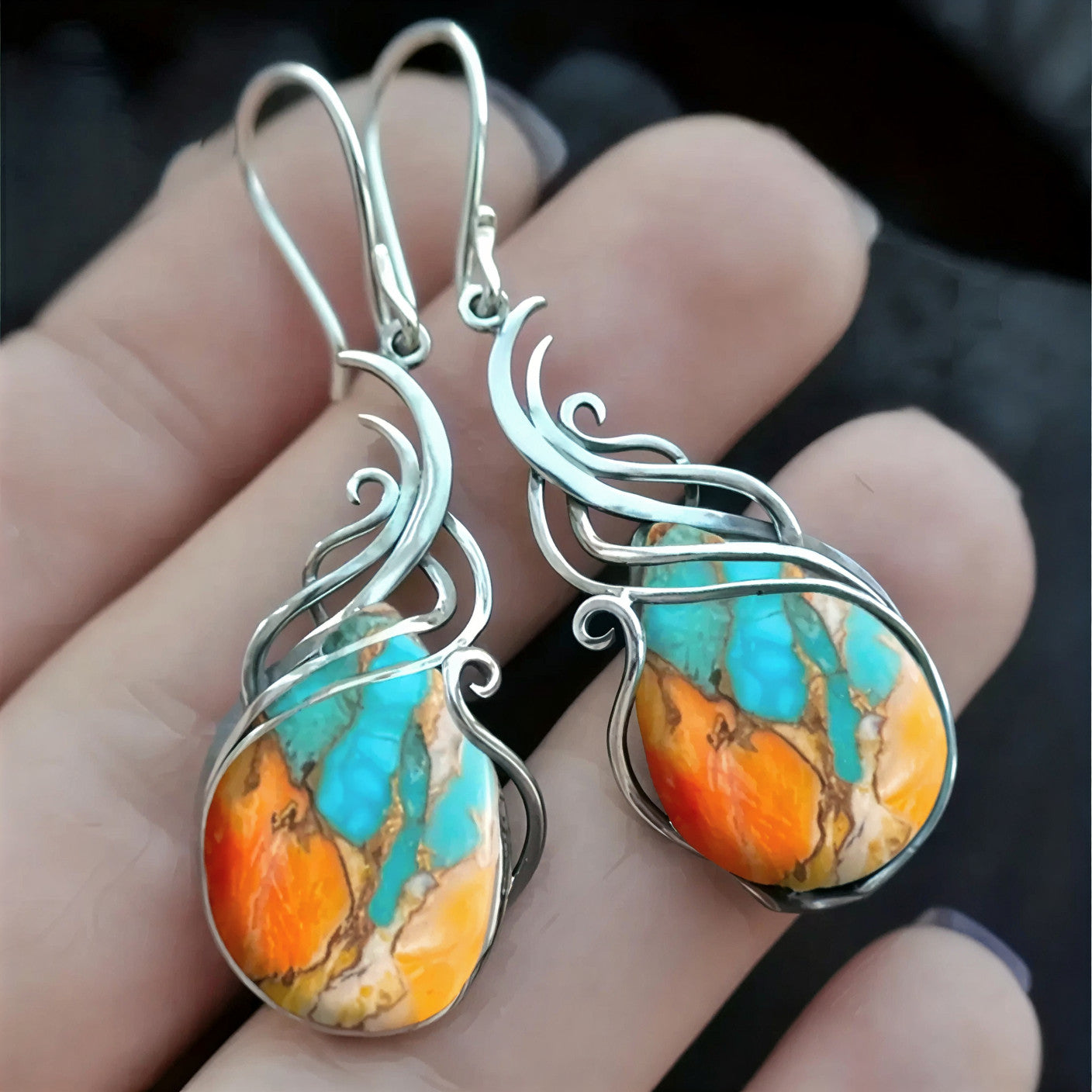 Silver teardrop gemstone earrings with turquoise/orange swirled filigree