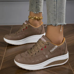Platform comfort sneakers in taupe-brown with white platform sole and red lace eyelets