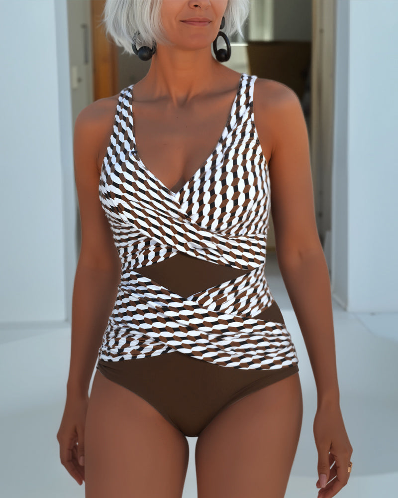 Women's cross-over swimsuit, white with dark geometric print and brown bottom