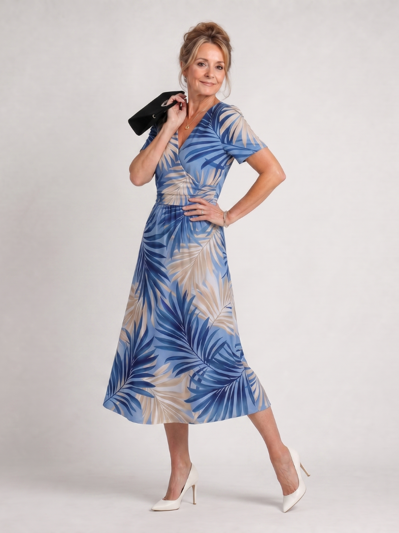 Blue-and-cream leaf print V-neck midi dress with short sleeves and cinched waist