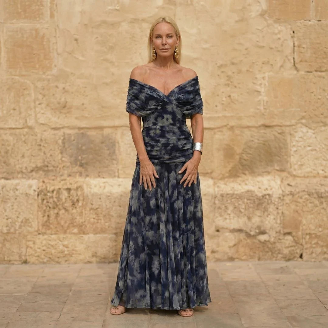 Blue off-shoulder maxi dress with sweetheart neckline and pleated skirt