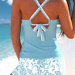 Back view of peacock blue tankini with crisscross straps and bow