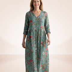Floral relaxed dress in teal with round floral motifs, V-neck, 3/4 sleeves, ankle-grazing