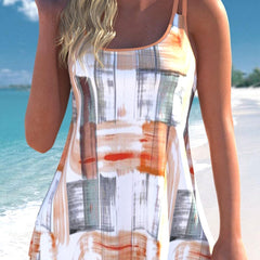 Orange and white printed tankini set with adjustable straps and matching swim shorts