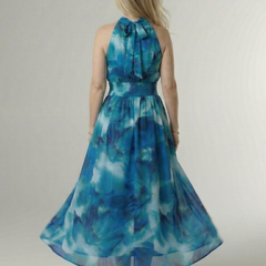 Blue gathered halter midi dress, back view, tie-neck and gathered waist