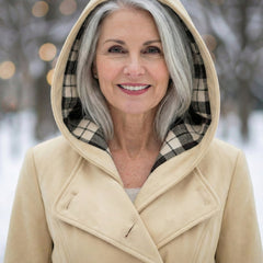 Cream wool hooded coat with plaid hood lining and double-breasted button front.