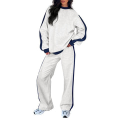 Light grey 2-piece lounge set with crewneck sweatshirt and loose jogger pants, navy side stripes