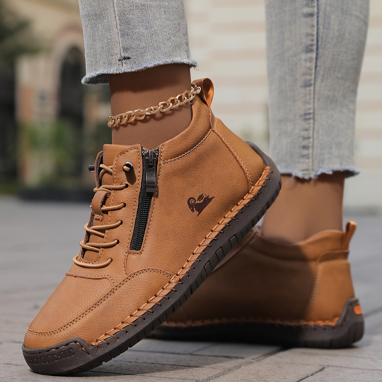Brown zip-up comfort shoes angled view, side zipper and stitched sole details