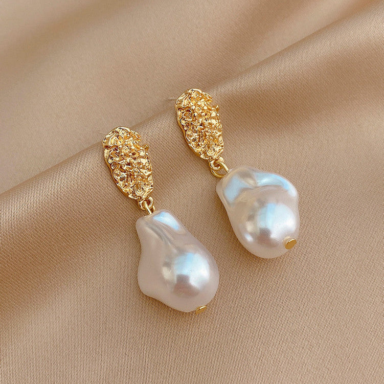 Gold textured stud-to-drop earrings with white pearl teardrops