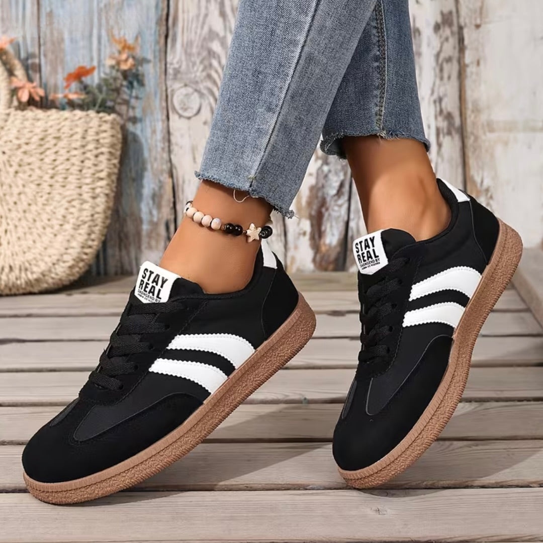Comfort sneakers in black with white triple stripe and tan rubber sole