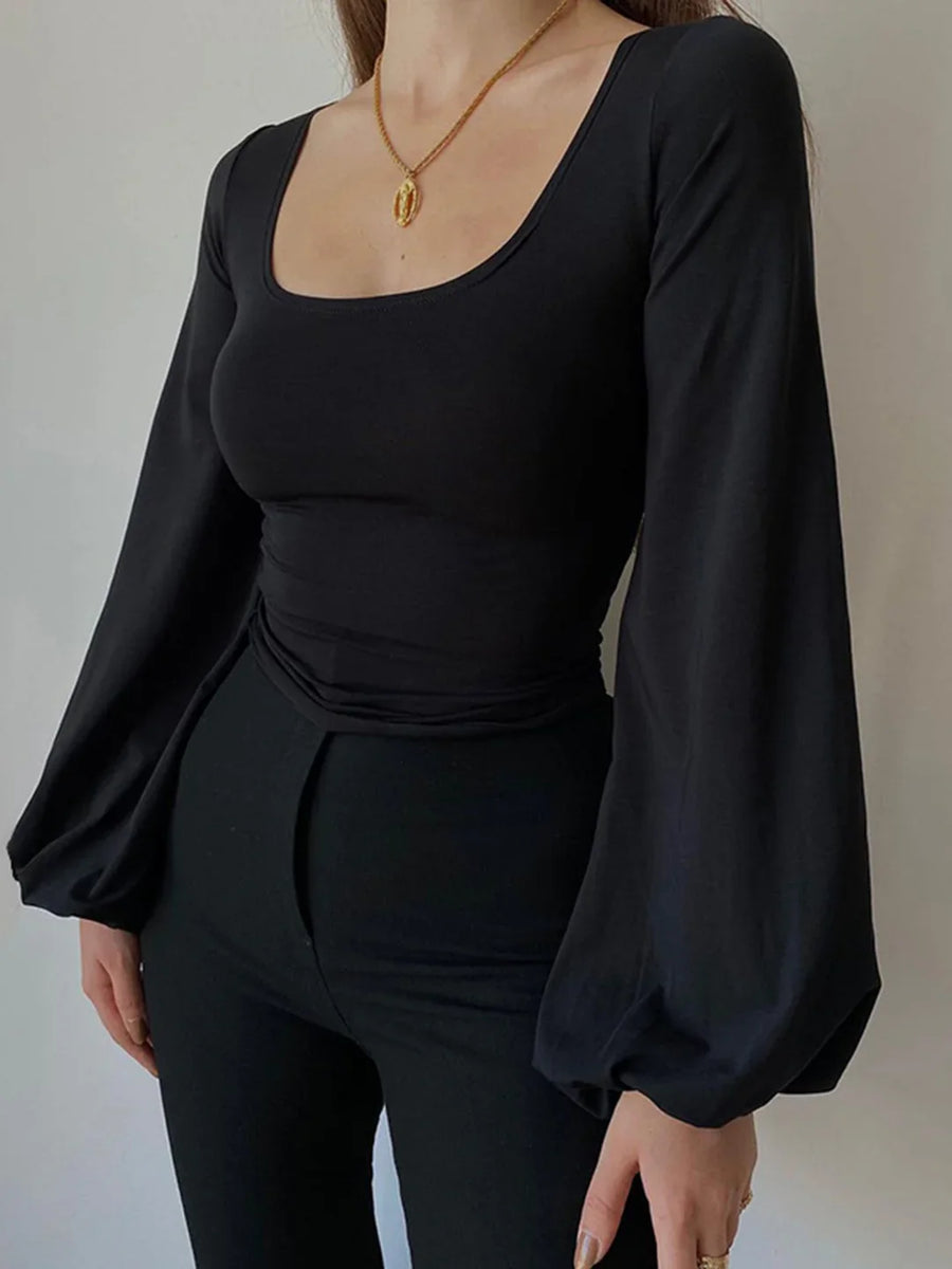 Alexa puff-sleeve square-neck blouse in black with gathered waist seams