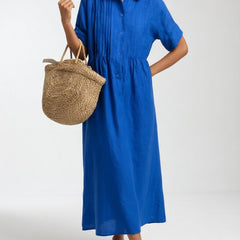 Blue shirt dress with short sleeves, button front, and gathered waist, midi length