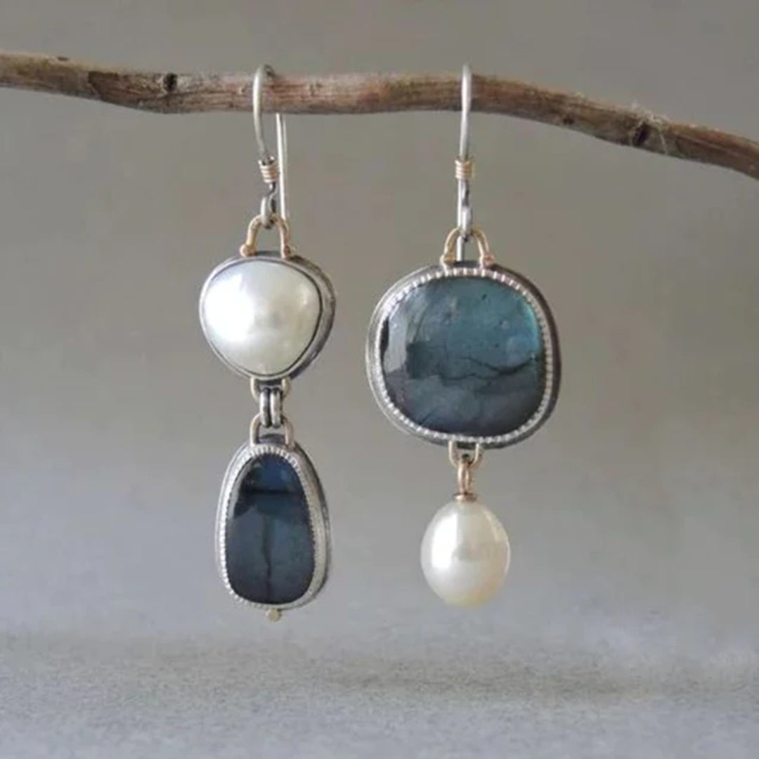 Silver hoop drop earrings with blue stone and white pearl charms