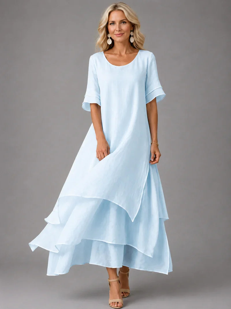 Light blue cotton ruffle midi dress with short sleeves and tiered flared hem