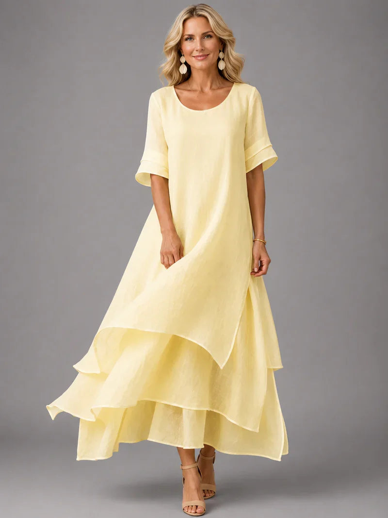 Yellow cotton ruffle midi dress with short sleeves and layered tiered hem