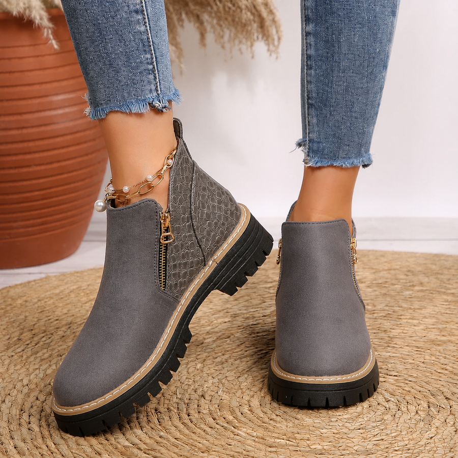 Women's ankle boots, dark gray suede with croc-pattern heel and front zip.