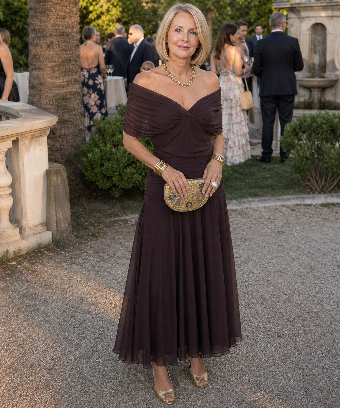 Off-shoulder flow maxi dress in dark brown, gathered bodice and flowing pleated skirt