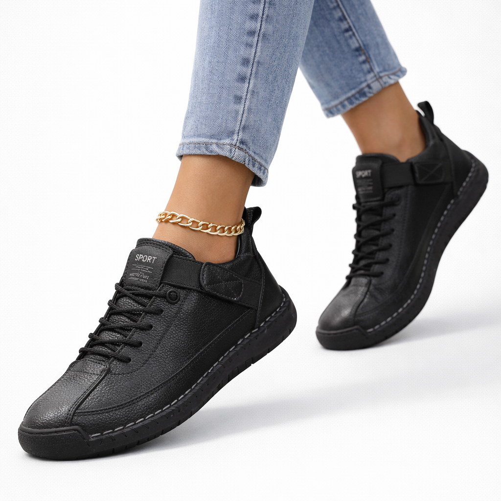 Black lace-up comfort sneakers with side strap and textured rubber sole