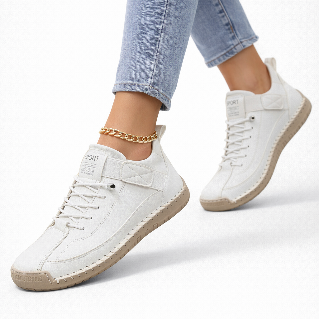 White lace-up comfort sneakers with side strap and textured rubber sole