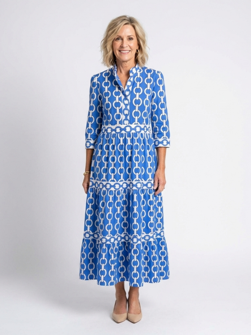 Blue chain-link pattern midi dress with 3/4 sleeves and tiered skirt hem