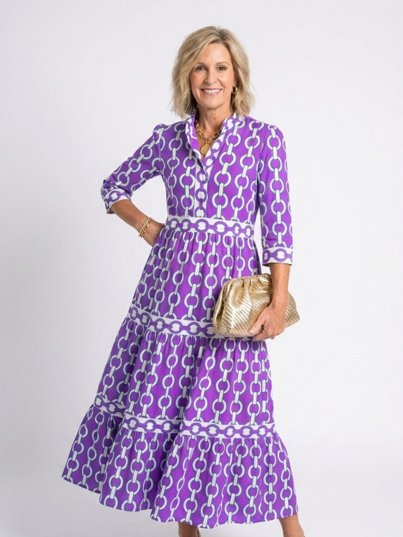 Purple chain-link pattern midi dress with 3/4 sleeves and tiered skirt