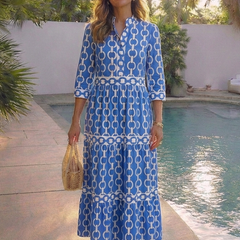 Blue chain-link pattern midi dress with 3/4 sleeves and tiered skirt
