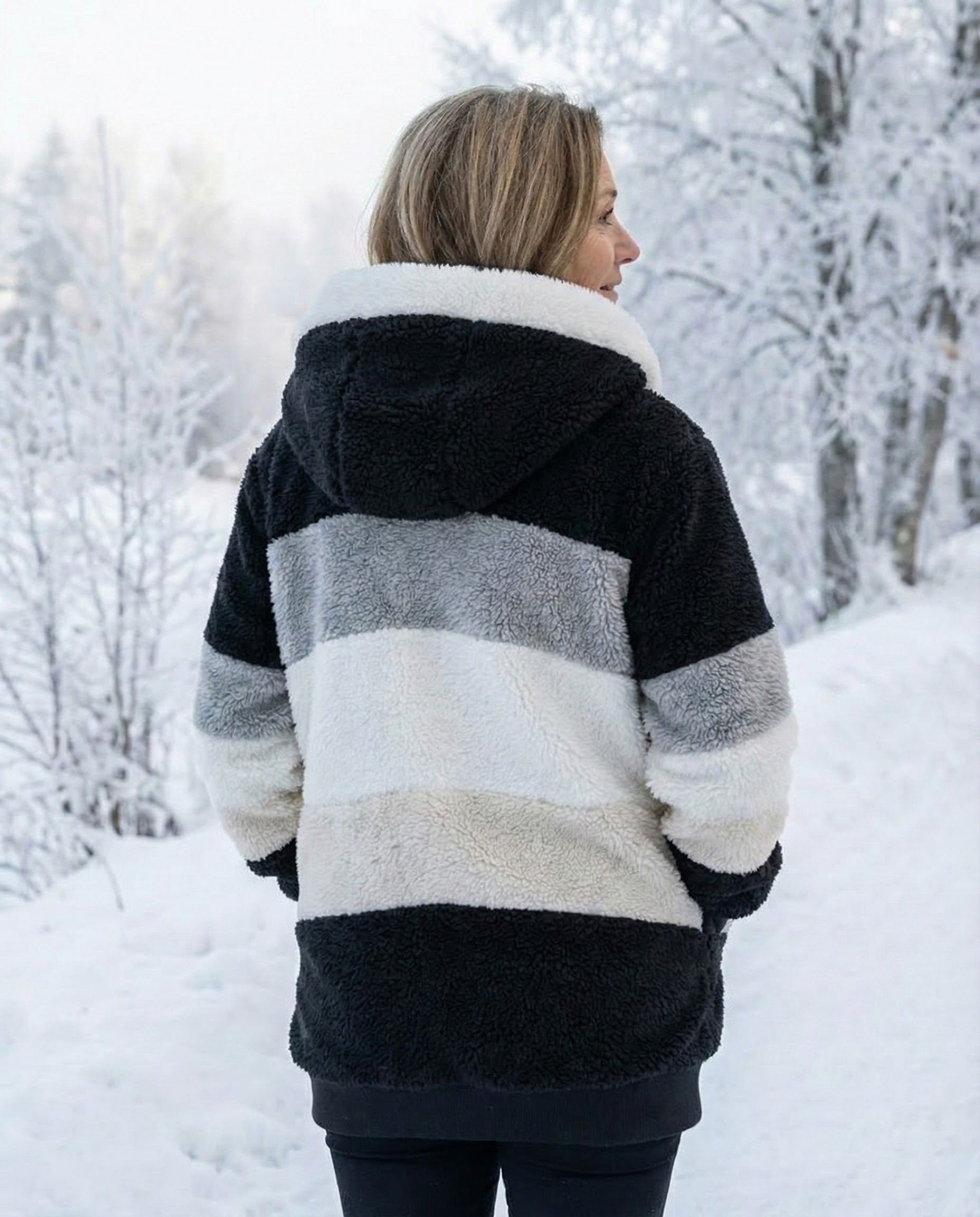 Colorblock plush jacket, back view, hood with white drawstrings; black, gray, white panels