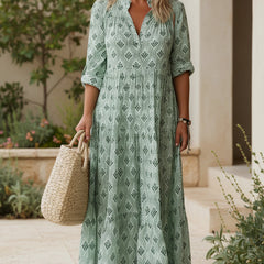 Mint green boho maxi dress with V-neck, short sleeves, geometric print