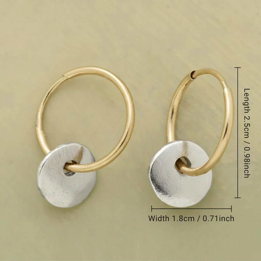Gold hoop earrings with brushed silver round disc charm, size shown