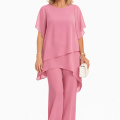 Pink fluid two-piece set with draped short-sleeve top and wide-leg pants