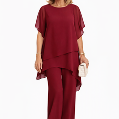 Burgundy fluid two-piece set with draped short-sleeve top and wide-leg pants