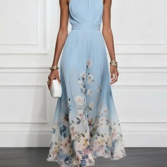 Light blue halter maxi dress with floral print skirt and draped bodice