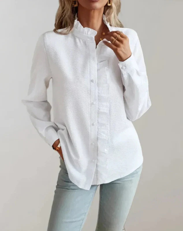 White ruffle-front blouse with button placket, high collar, long sleeves