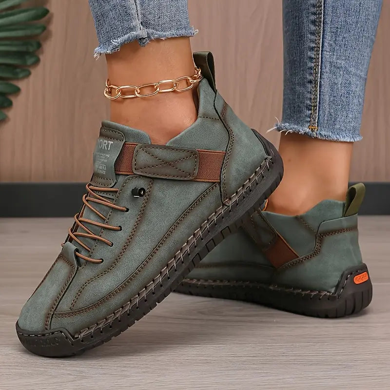 Green comfort sneakers with lace-up front and chain ankle strap with rugged sole