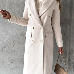 Cream long double-breasted coat with notched lapel, front button placket, flap pockets