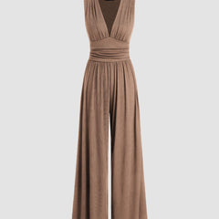 Camel sleeveless wide-leg jumpsuit with V-neck, ruched bodice and gathered waist.